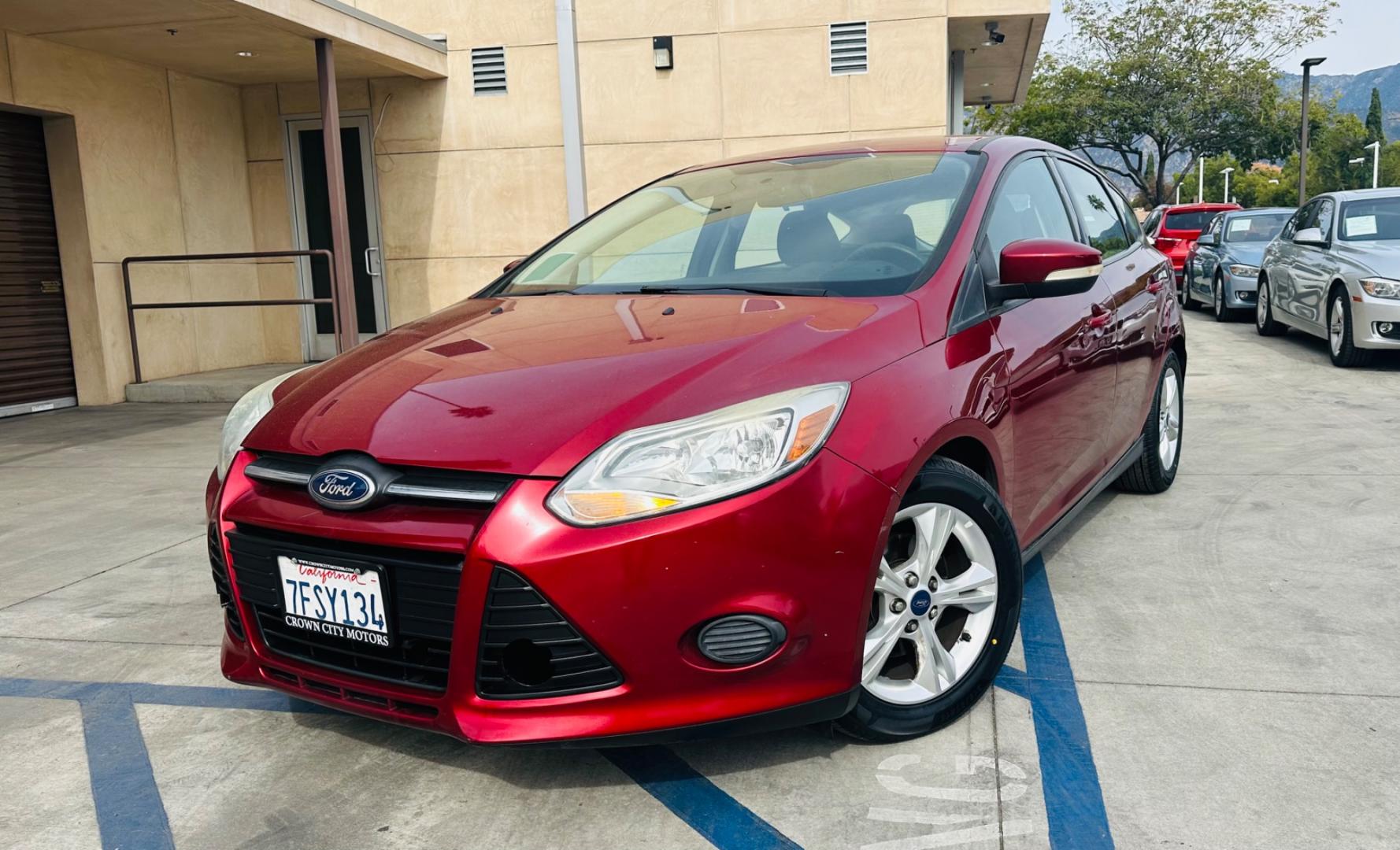 2014 RED /Gray Ford Focus Cloth (1FADP3K24EL) with an 4 Cylinders engine, Automatic transmission, located at 30 S. Berkeley Avenue, Pasadena, CA, 91107, (626) 248-7567, 34.145447, -118.109398 - Good Value! Good MPG! - Photo#0